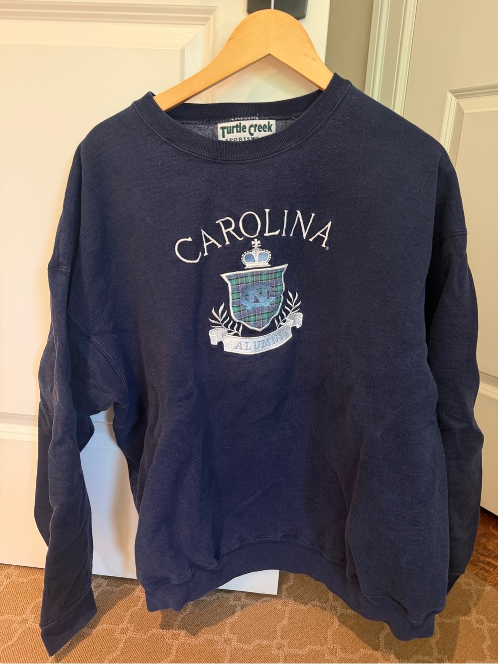 UNC Alumni Embroidered Crest Navy Sweatshirt